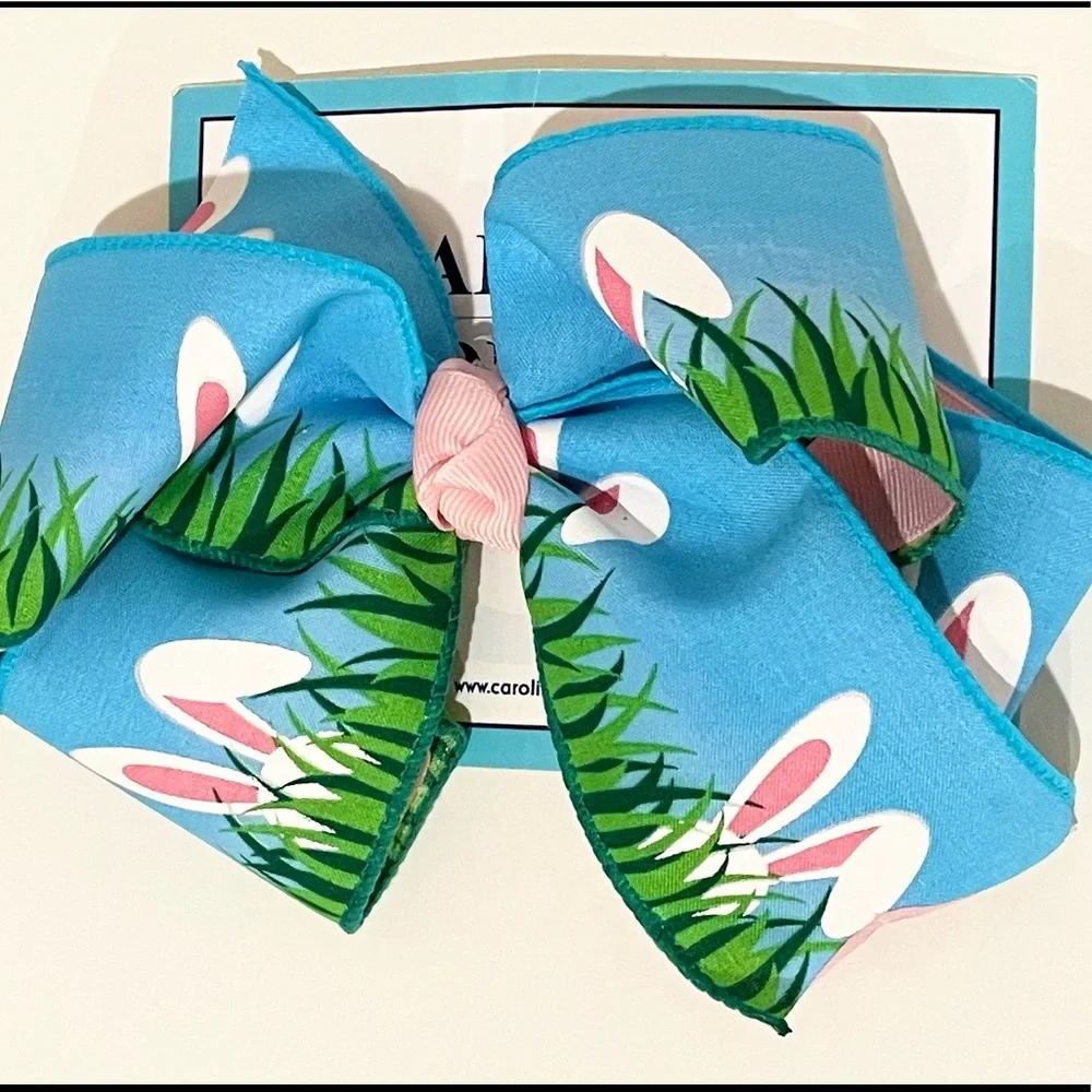 Large, colorful, double hair bow with bunny ears